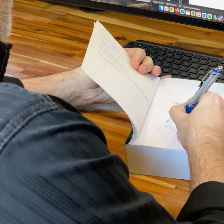 Screenshot-of-me-Autographing-The-Four-Part-Key.jpg__PID:9a5cc476-412a-4a6b-89e7-d2169dfbfdbf