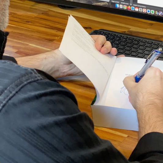 Screenshot-of-me-Autographing-The-Four-Part-Key.jpg__PID:9a5cc476-412a-4a6b-89e7-d2169dfbfdbf